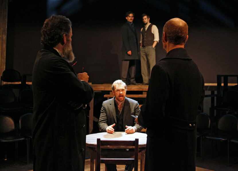 Actor Ian Ferguson (Samuel Arnold), center, during a scene of the theatre production of...