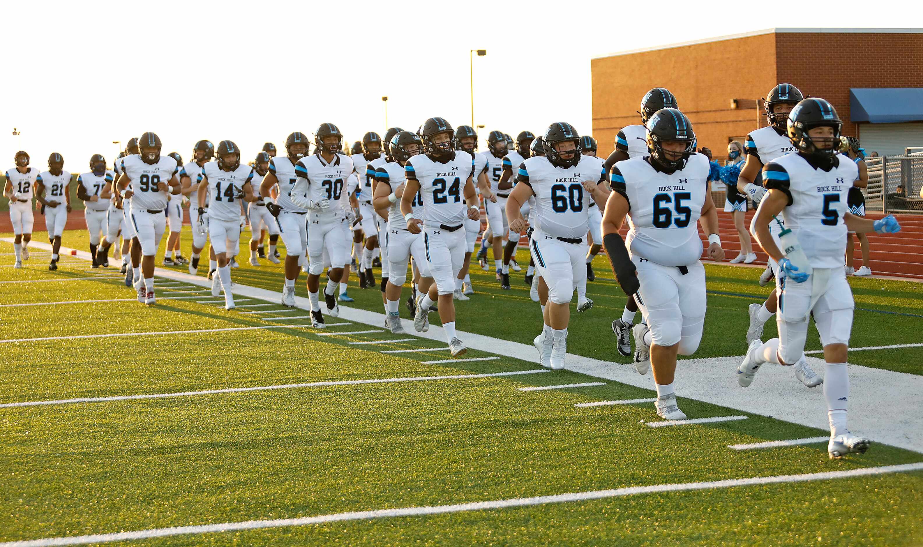 Rock Hill High School takes the field for the first time as Heritage High School hosted Rock...