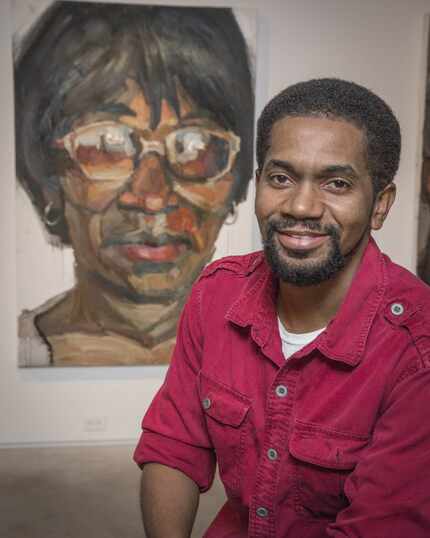 Sedrick Huckaby poses with a large painting of his mother, Ruthie Huckaby of Fort Worth, at...