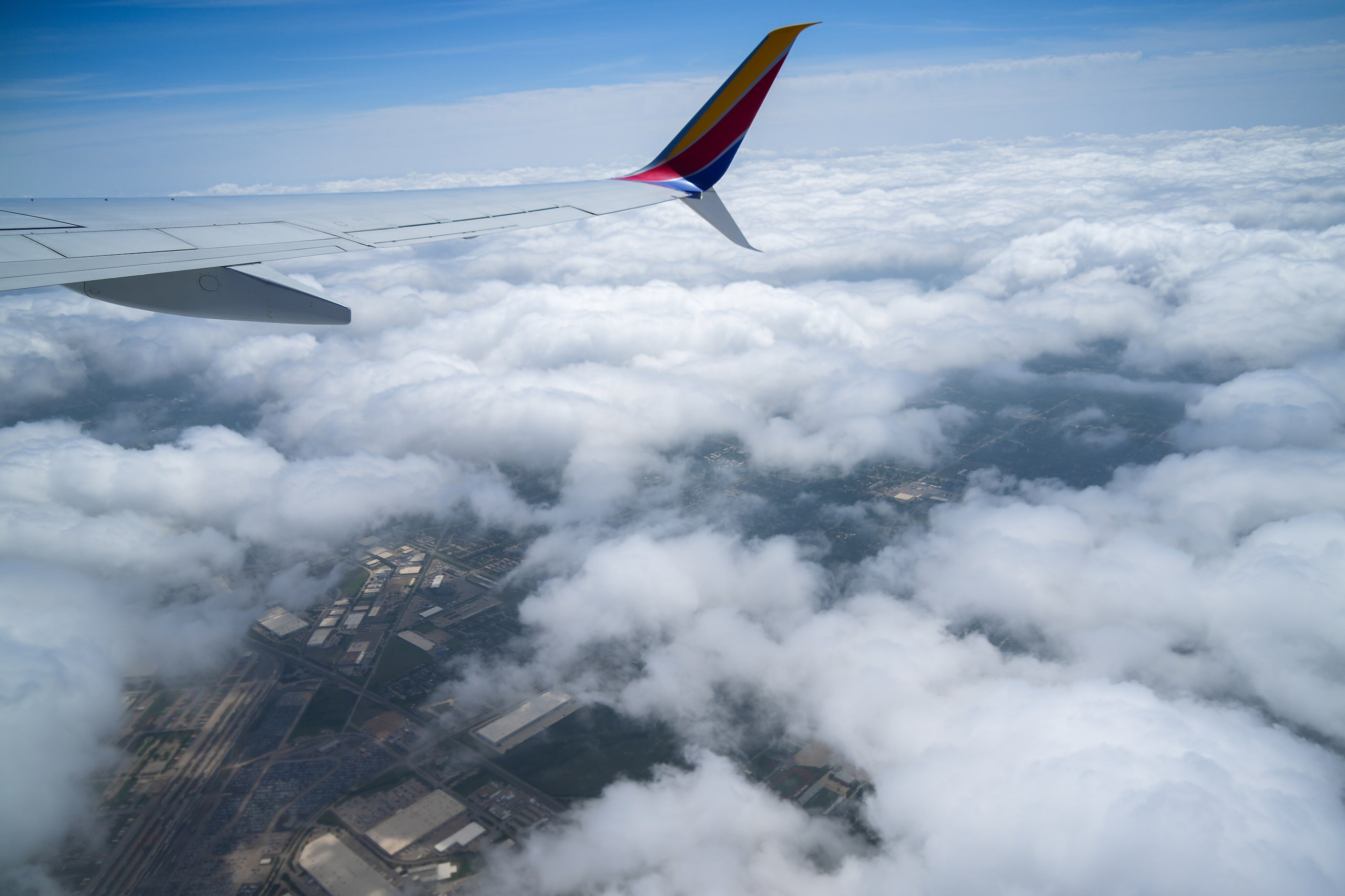 A few breaks in cloud cover over southern Dallas during the early stages of a total solar...