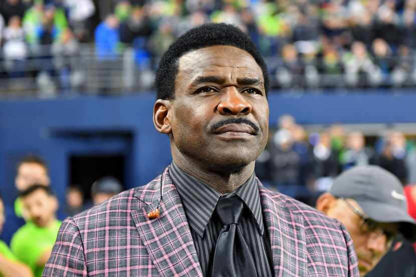 HOF wide receiver Michael Irvin of the Dallas Cowboys watches the game against the Seattle...
