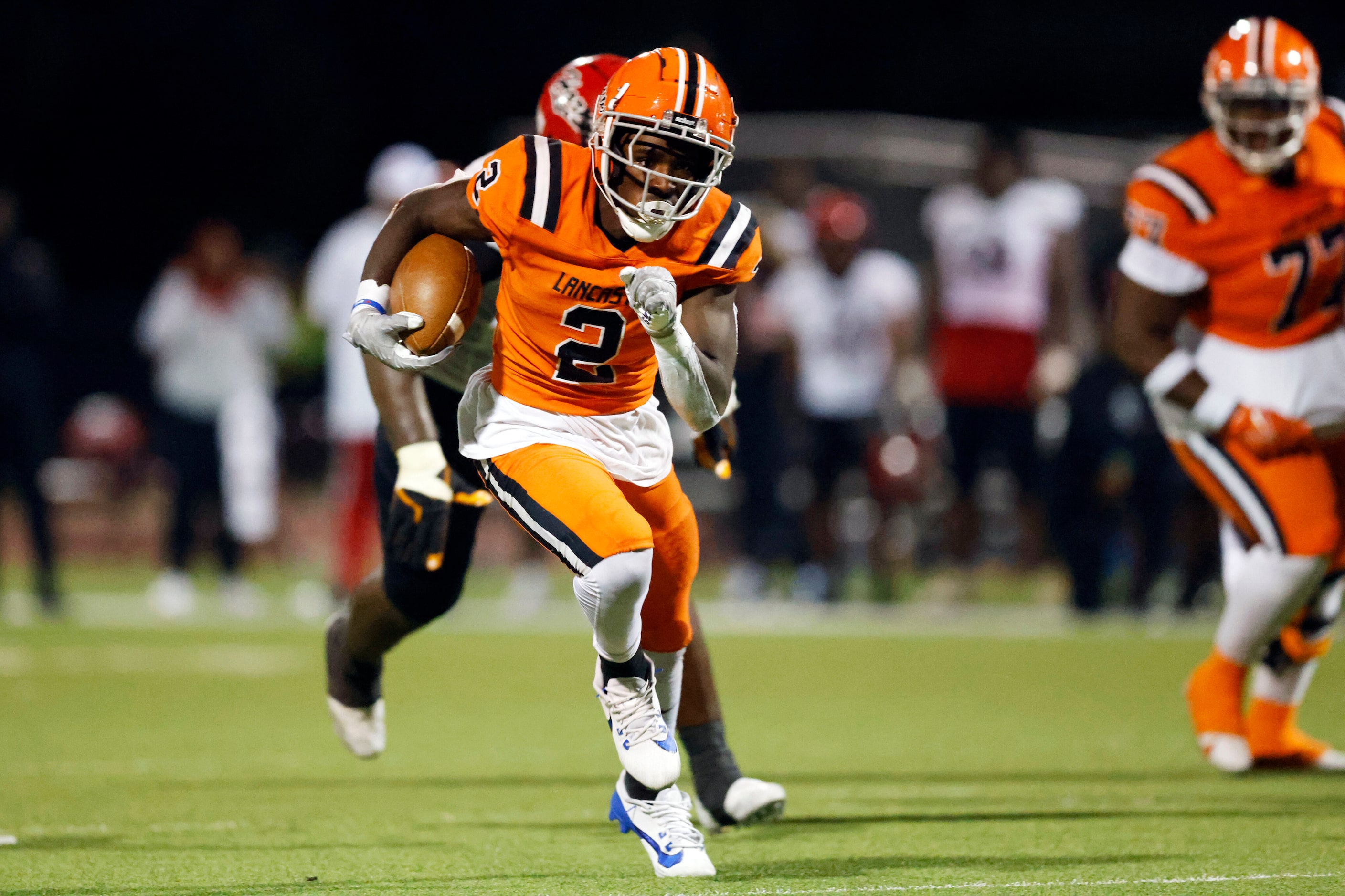 Lancaster running back Izayah Lee (2) runs for the game-winning touchdown during overtime of...