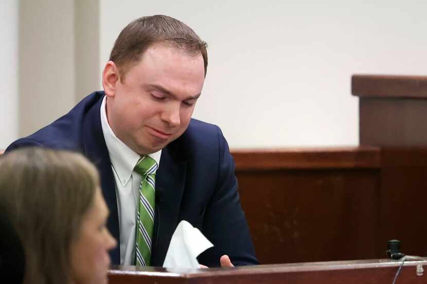 Defendant Aaron Dean reacts on the stand while testifying on Monday, Dec. 12, 2022, in Fort...