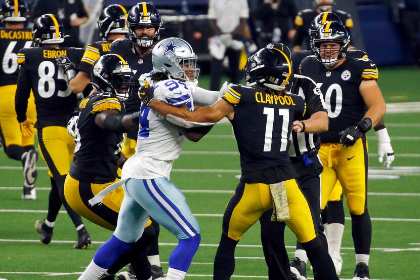 Dallas Cowboys defensive end Randy Gregory (94) and Pittsburgh Steelers wide receiver Chase...
