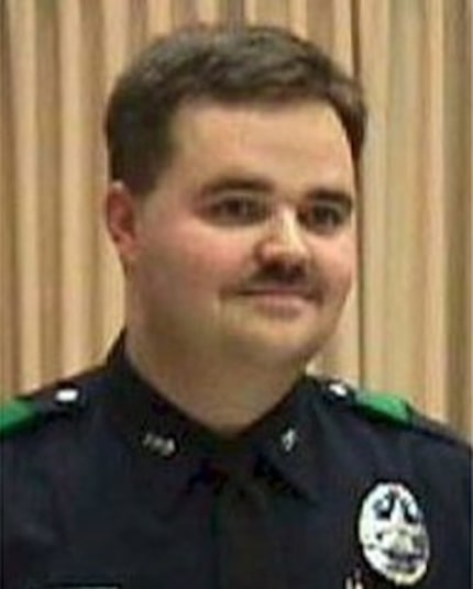 Officer Aubrey Hawkins was killed as he investigated a robbery at an Oshman's Sporting Goods...