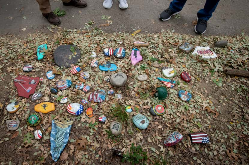 A cluster of rocks devoted to U.S. military branches on the rock art trail at Parr Park in...