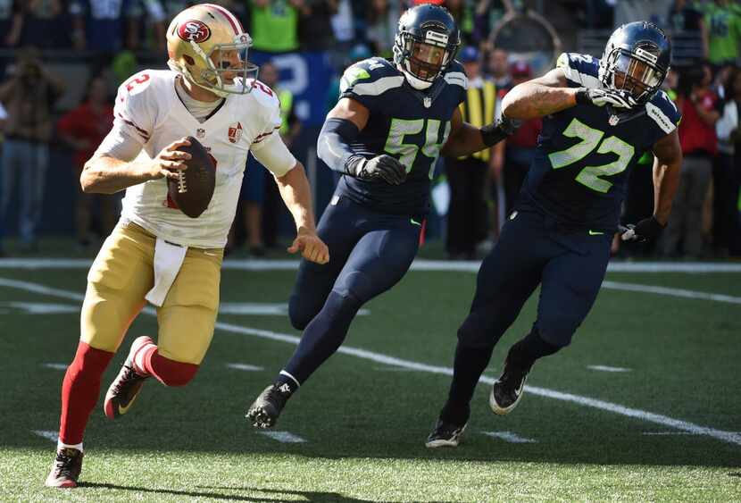 SEATTLE, WA - SEPTEMBER 25: Quarterback Blaine Gabbert #2 of the San Francisco 49ers...