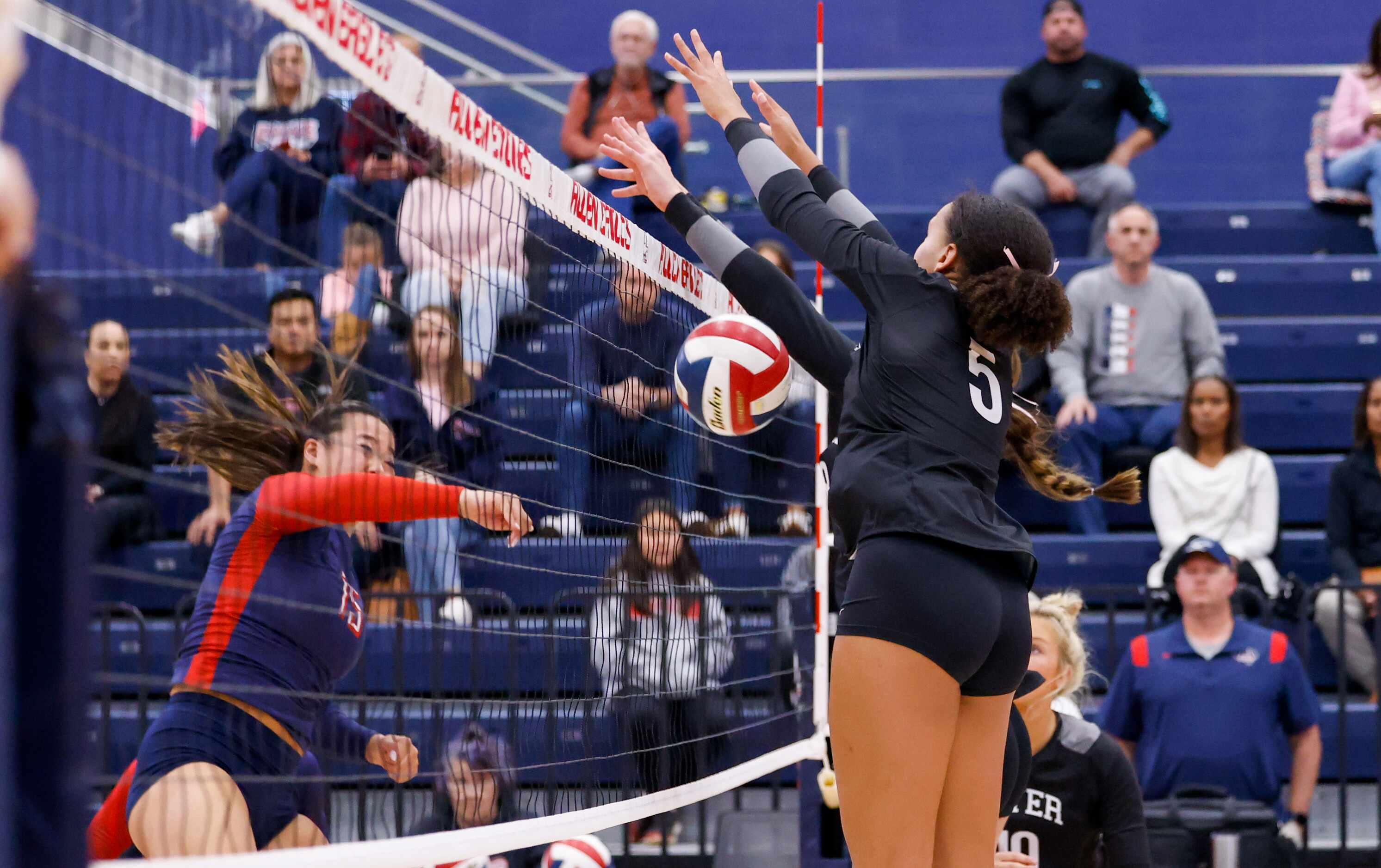 A spike from Allen senior Janet Zhang (15) falls in front of  Denton Guyer senior Kyndal...