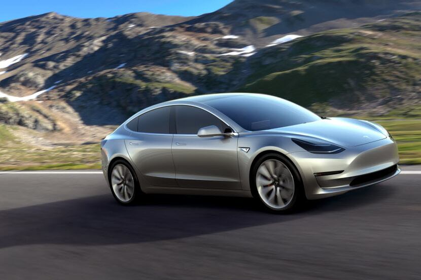 This undated photo provided by Tesla Motors shows the Model 3 car. The promise of an...