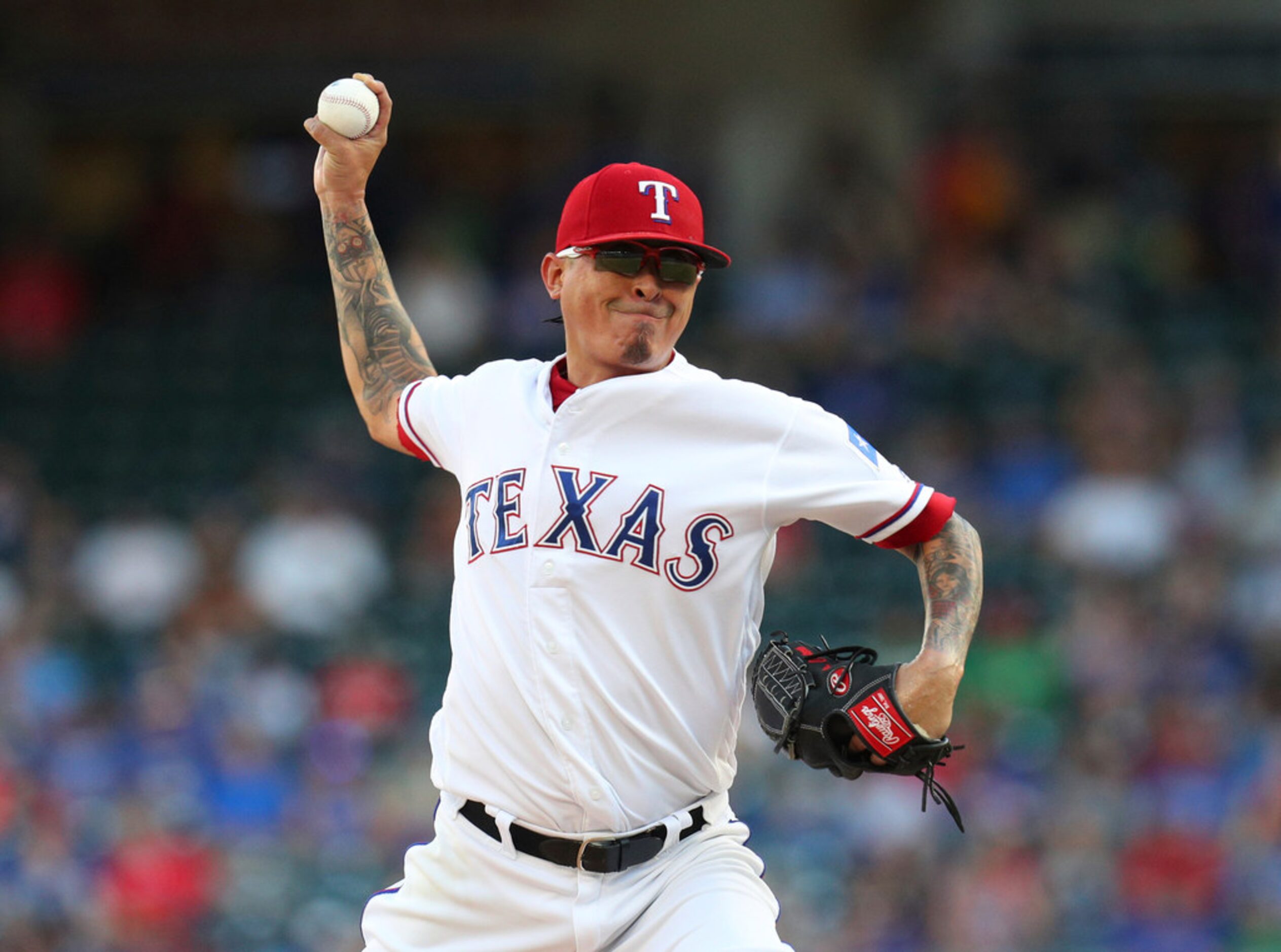 Texas Rangers pitcher Jesse Chavez (53) works the first inning of a baseball game against...