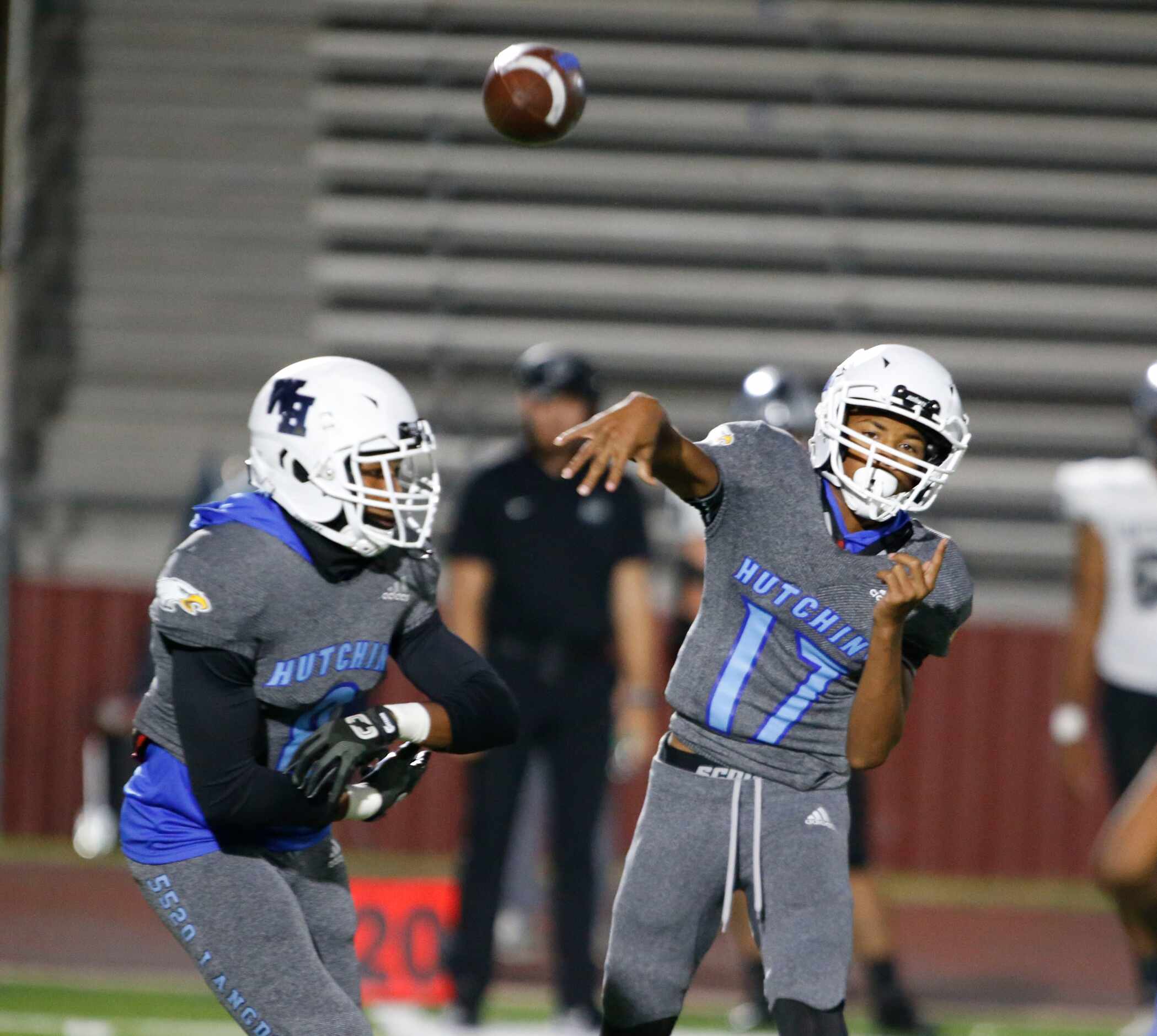 Wilmer-Hutchins QB TJ McMillion (17) throws a pass during the first half of a high school...