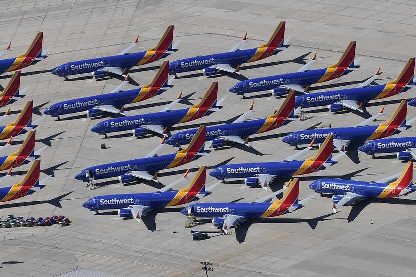 Southwest Airlines Boeing 737 MAX aircraft are parked on the tarmac after being grounded, at...