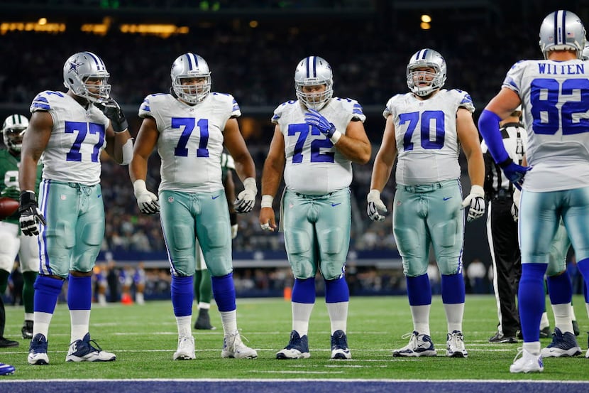 Dallas Cowboys lineman including tackle Tyron Smith (77), offensive guard La'el Collins...