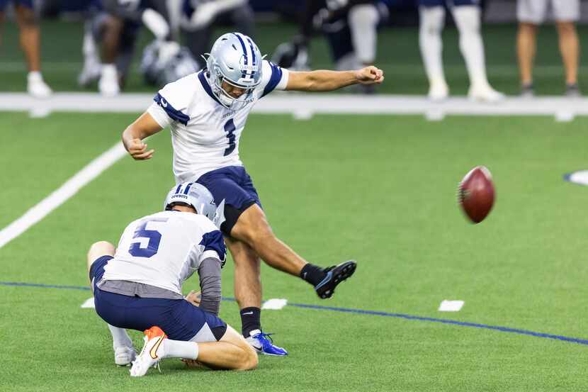 Dallas Cowboys kicker Jonathan Garibay (1) kicks a field goal during a minicamp practice at...