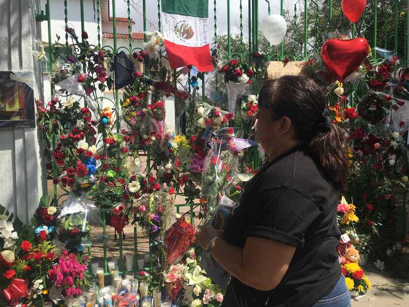 Mourners placed flowers outside a home owned by singer Juan Gabriel in Ciudad Juarez, the...