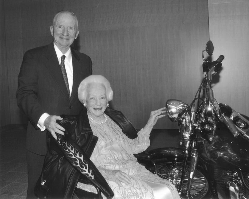Ross Perot with Margaret McDermott at a party thrown in her honor at University of Texas...