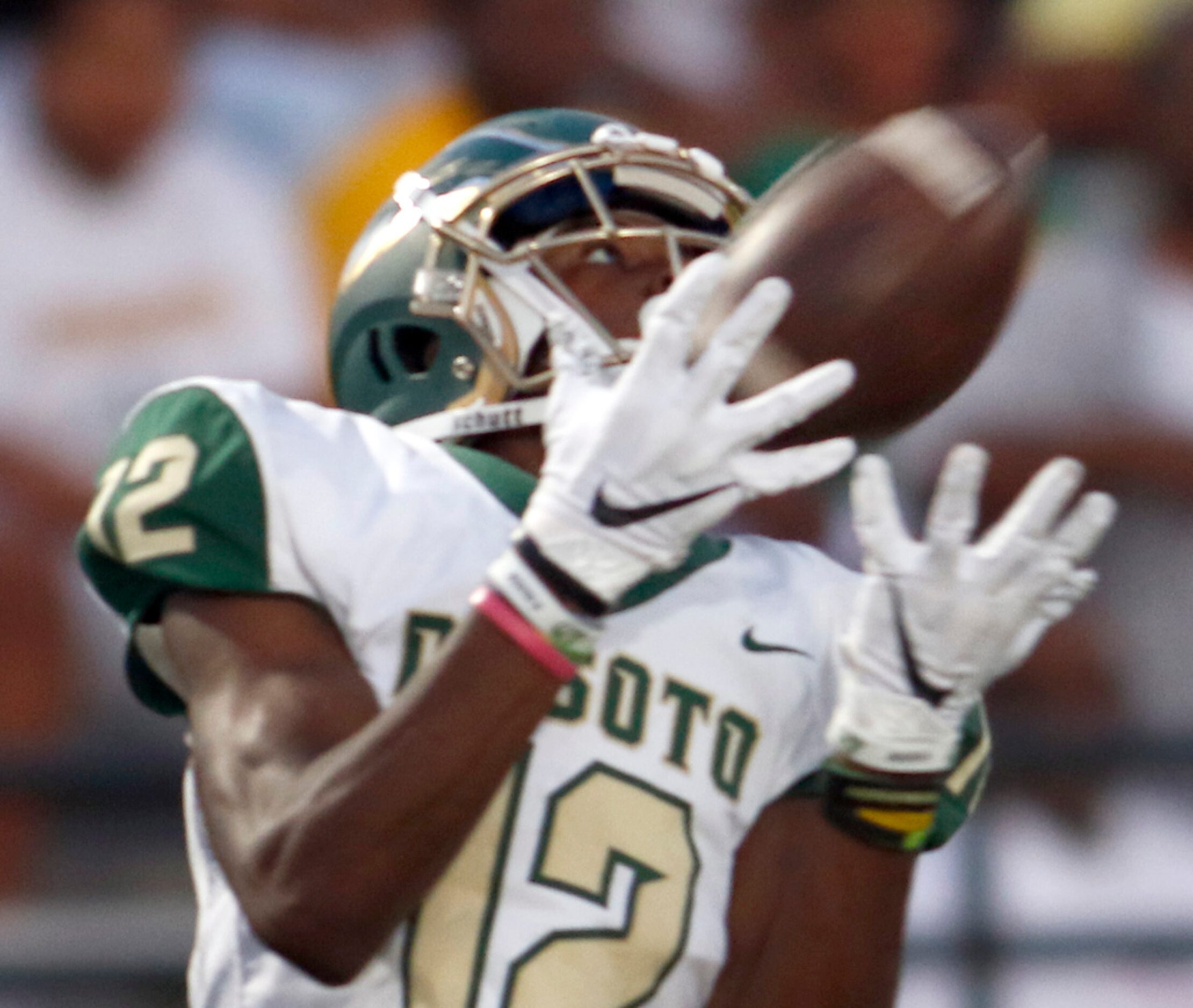 DeSoto receiver Jaedon Wilson (12) pulls in a 70-yard touchdown reception during second...