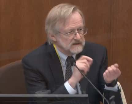 In this image from video, Dr. Martin Tobin testifies April 15, 2021, in the trial of former...
