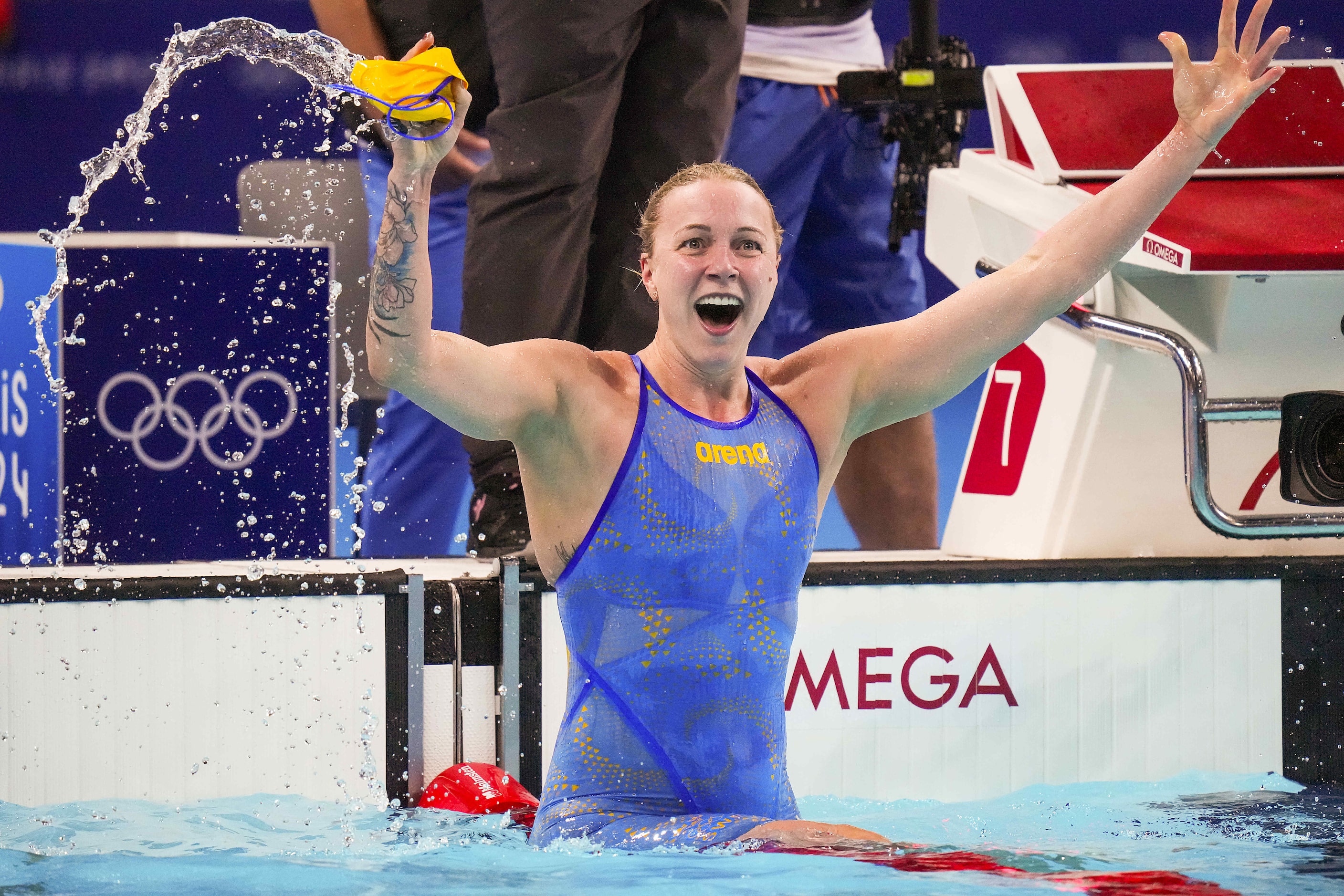 Sarah Sjoestroem of Sweden celebrates winning the women’s 100-meter freestyle final at the...