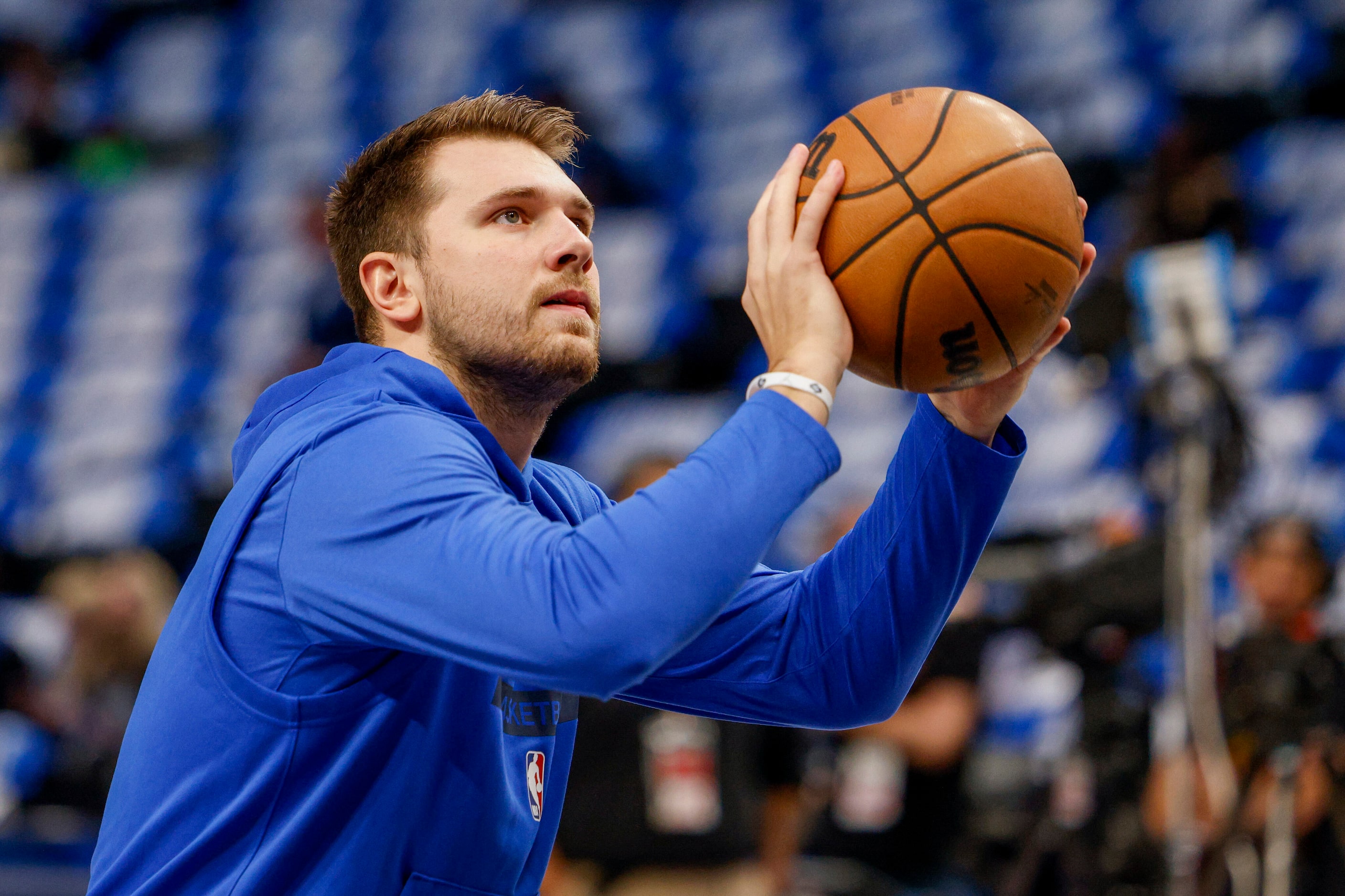 Dallas Mavericks guard Luka Doncic (77) warms up before the Mavs home opener at the American...