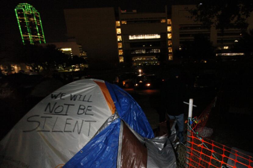 An Occupy Dallas tent served as a sign board before the group's eviction by Dallas police in...