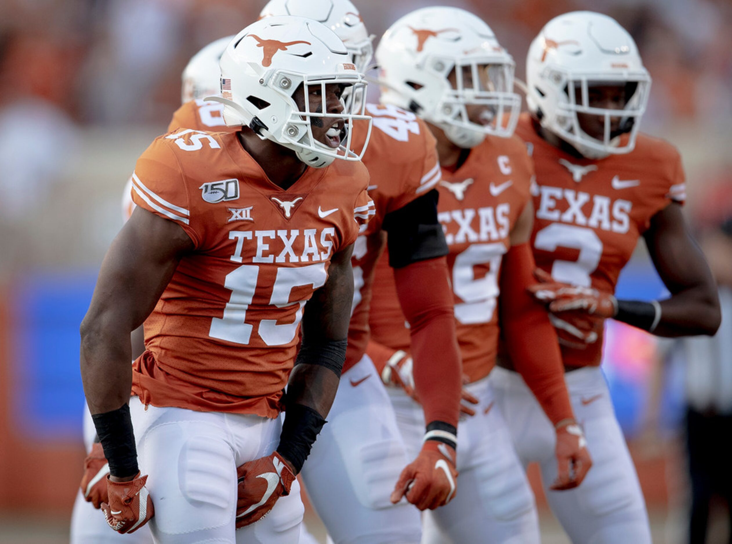 Texas defensive back Chris Brown (15) celebrates a defensive stop against Oklahoma State on...