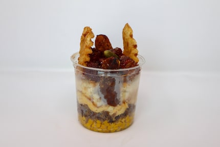 Dickel's Triple Meat Big Back Snack is a new concession item at the State Fair of Texas in...