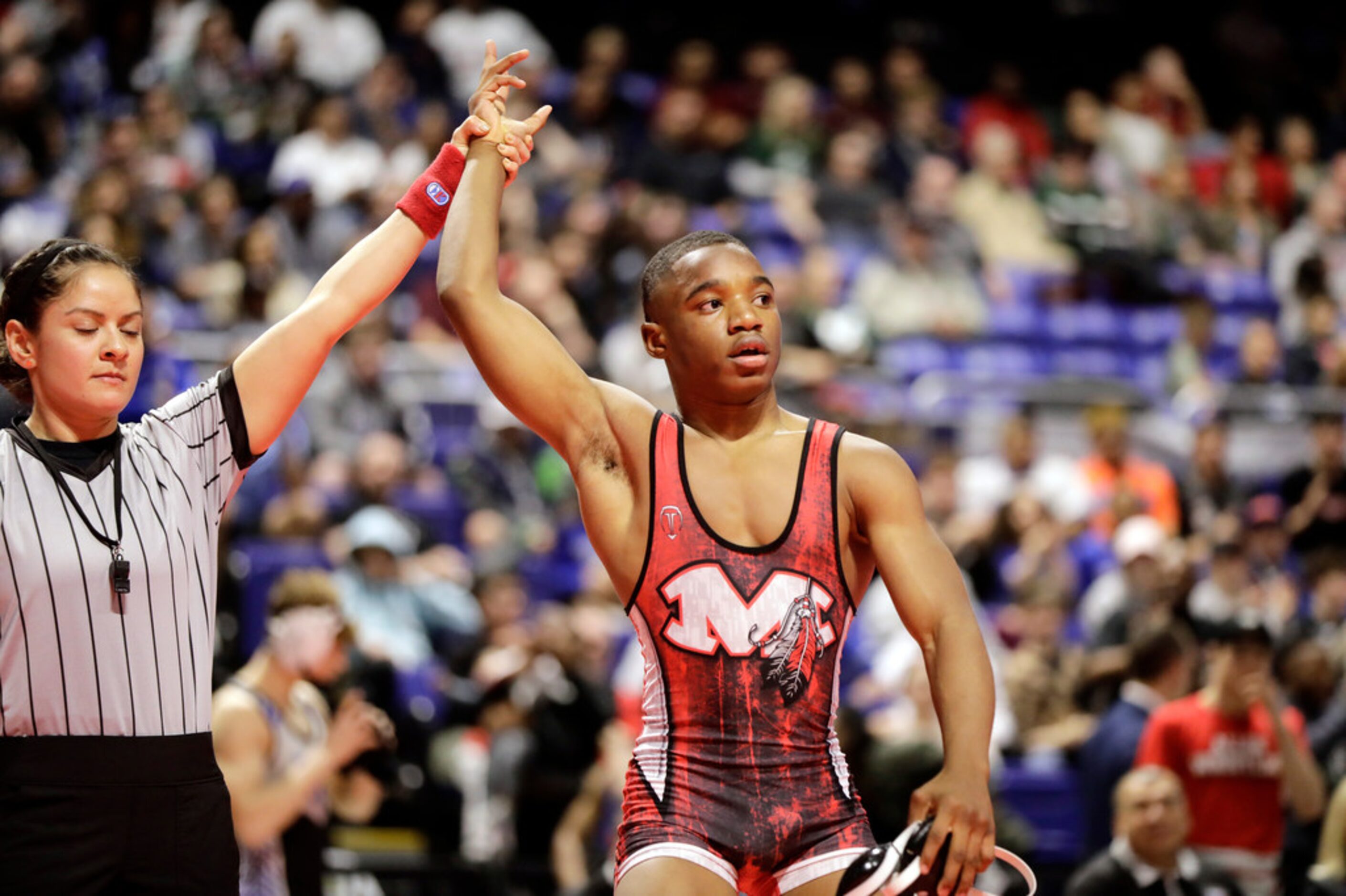 Donovan Whitted of Arlington Martin wrestles during the UIL Texas State Wrestling...