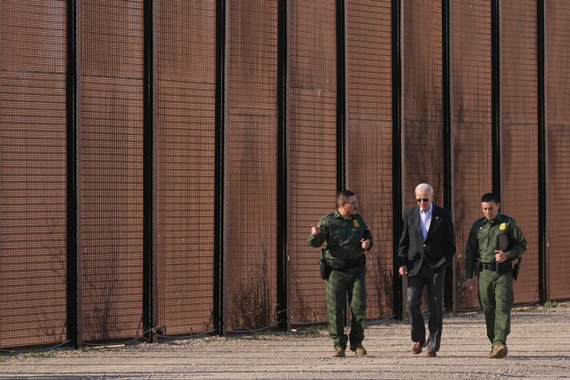 President Joe Biden walked with U.S. Border Patrol agents along a stretch of the U.S.-Mexico...