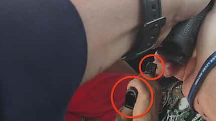 Footage from an officer's body camera shows that the suspect's gun did not have a magazine...