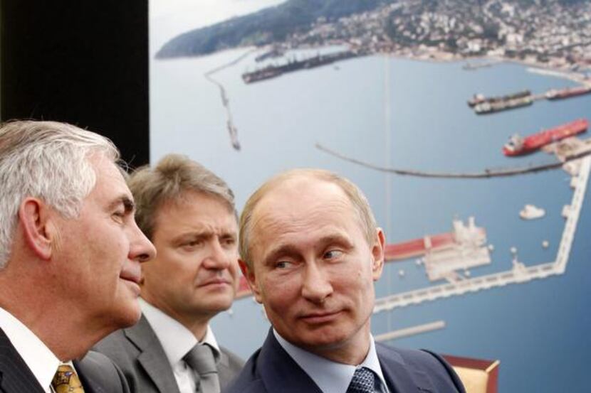 
Exxon Mobil Chairman and CEO Rex Tillerson (left) and Russian President Vladimir Putin...