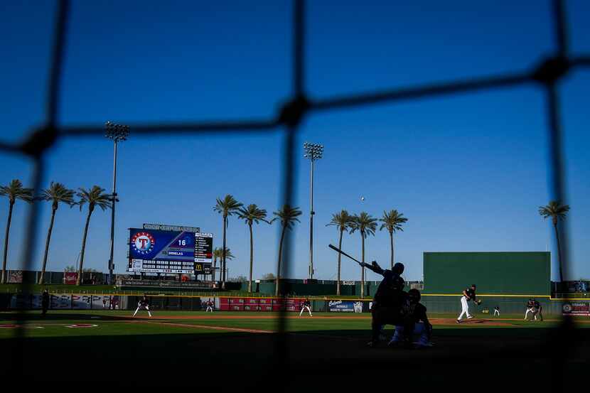 Texas Rangers infielder Jonathan Ornelas completes the 25 run outburst by the Rangers with a...