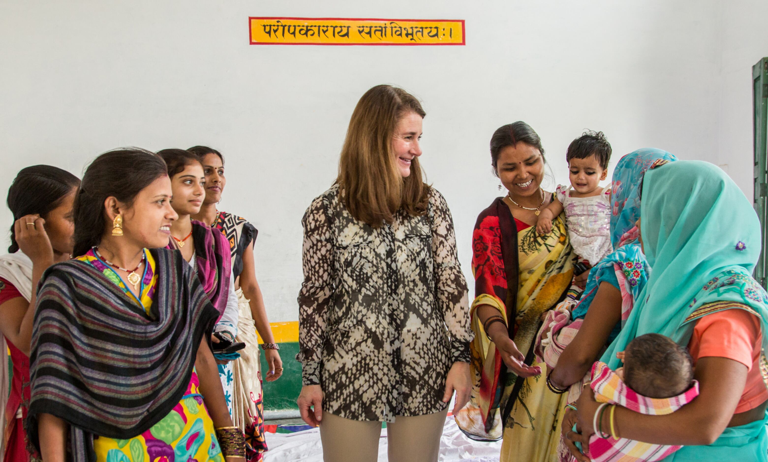 Melinda Gates, Co-chair of Bill and Melinda Gates Foundation, interacts with young married...