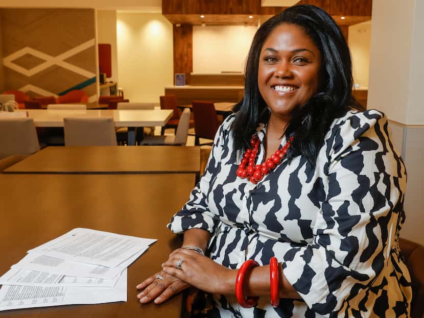 LaTosha Williams sits with printed information on Texas House Bill 1747, one of several...