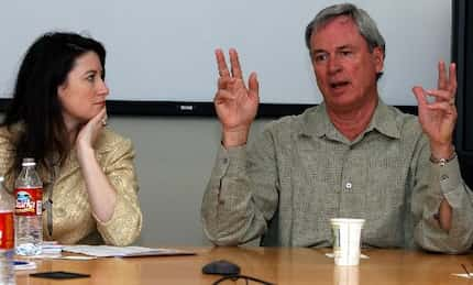 At left, Jennifer Michalski of Sevin Rosen Funds listens as Berry Cash of InterWest Partners...