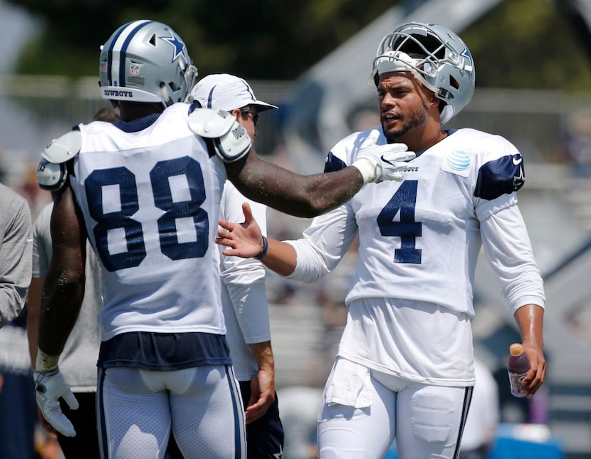 Dallas Cowboys quarterback Dak Prescott (4) and Dallas Cowboys wide receiver Dez Bryant (88)...