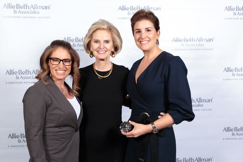From left, Julie Haymann, president/CEO Allie Beth Allman and Lauren Savariego celebrate the...
