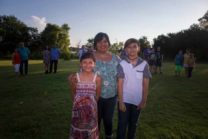 Sadie, Melissa and Trevor Baize attend an event for families with trans children on July 7...
