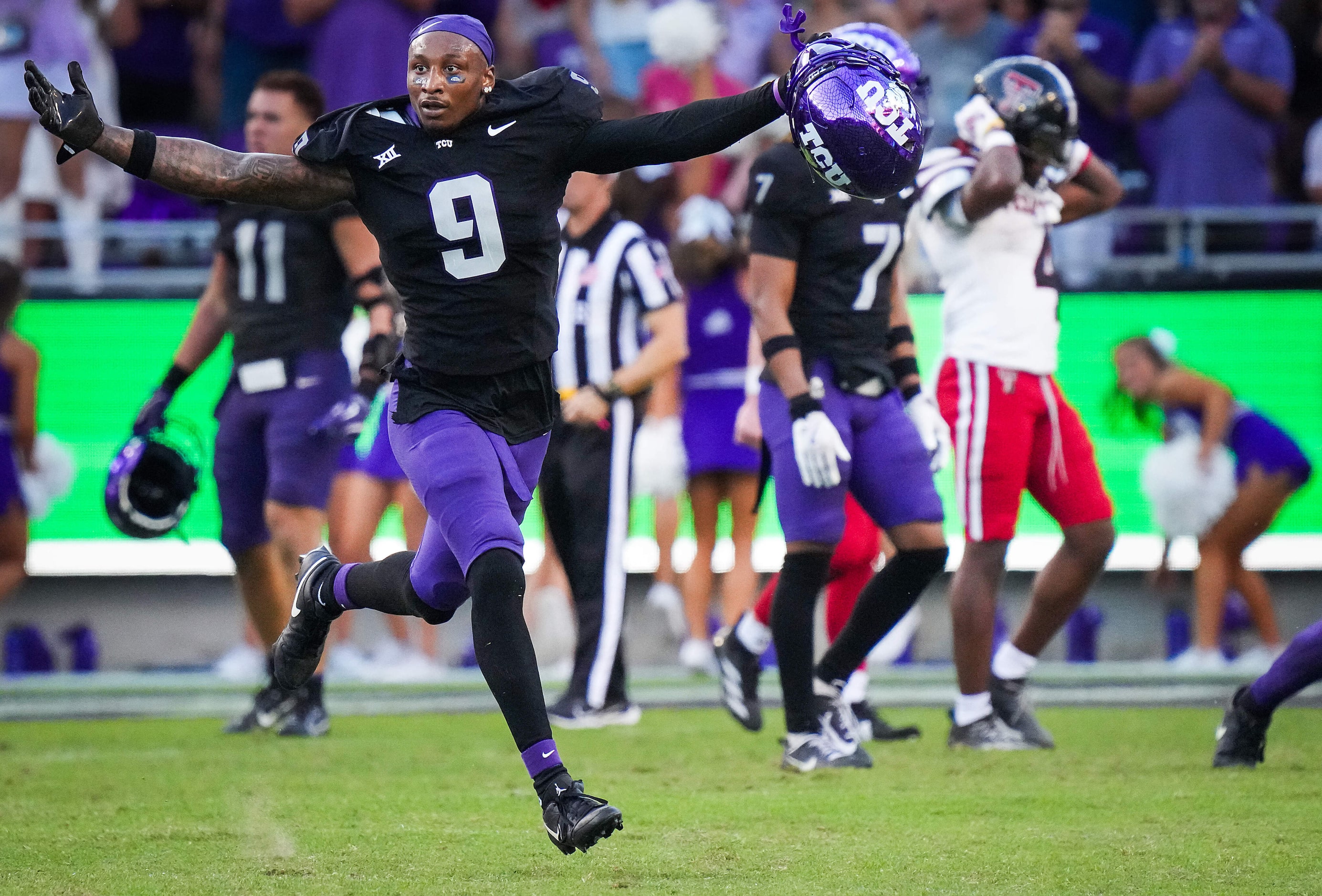 TCU linebacker Marcel Brooks (9) celebrates after a 35-34 victory over Texas Tech in an NCAA...