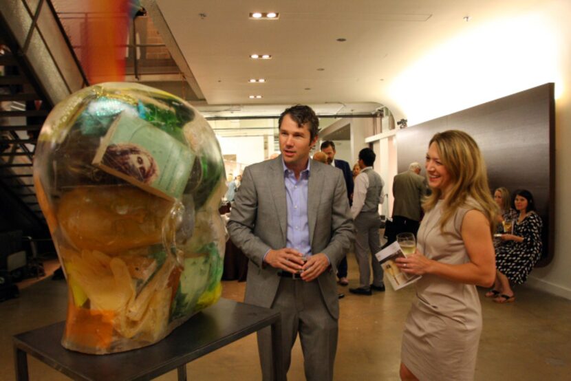 Art collector Alden Pinnell, left, with Janelle Pinnell, right, at the Dallas Art Fair...