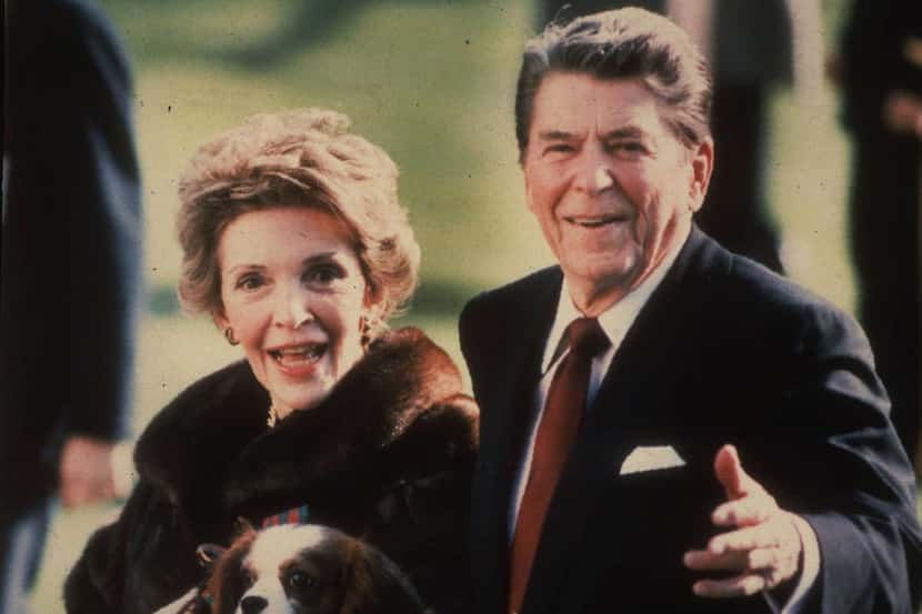 
Nancy and Ronald Reagan, with Rex, outside th White House in December 1886. The former...
