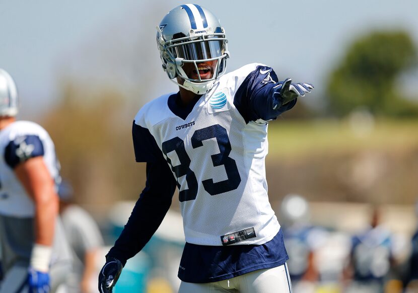 Dallas Cowboys wide receiver Terrance Williams (83) checks off at the line of scrimmage...