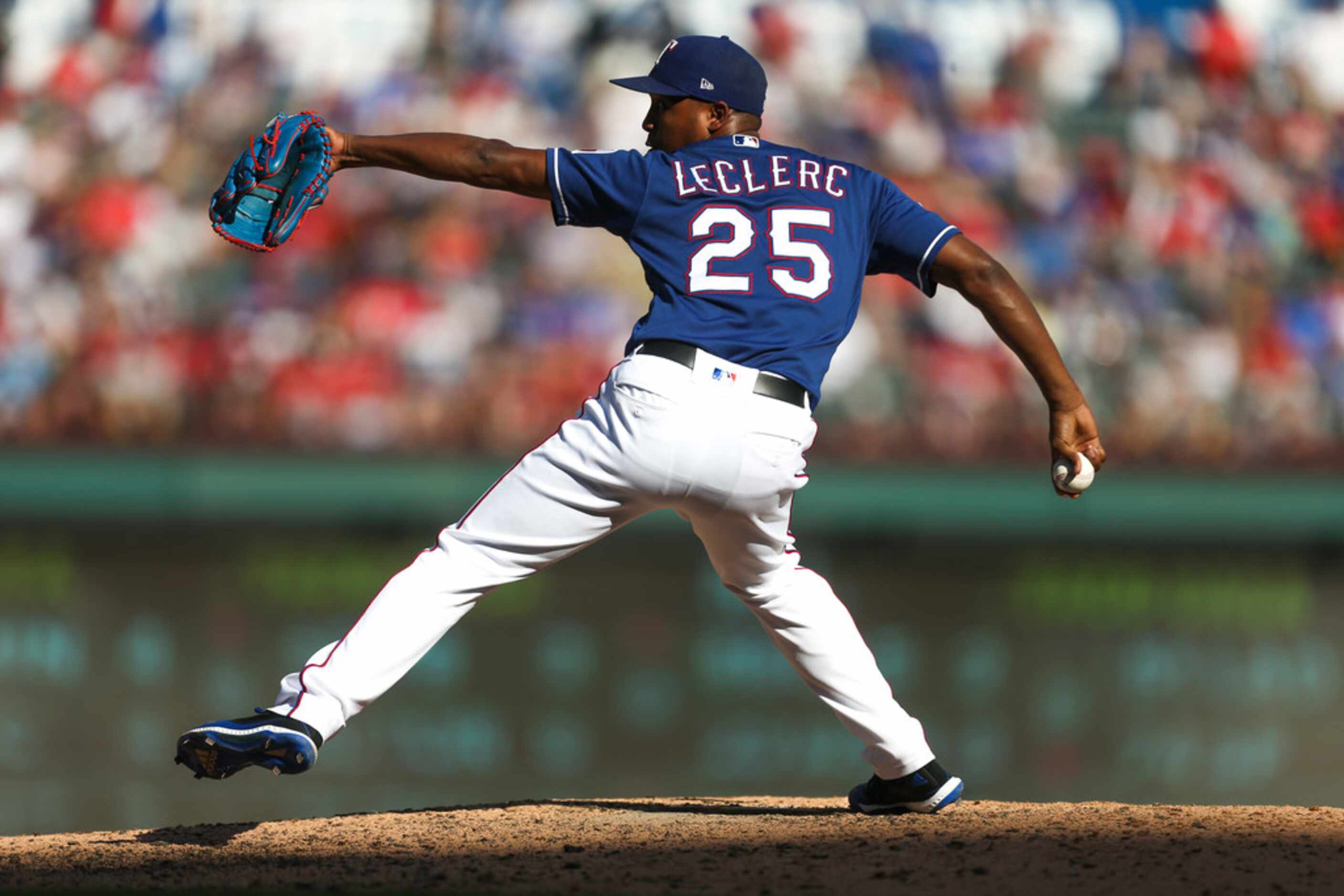 Texas Rangers relief pitcher Jose Leclerc (25) pitches in the eighth inning during a MLB...
