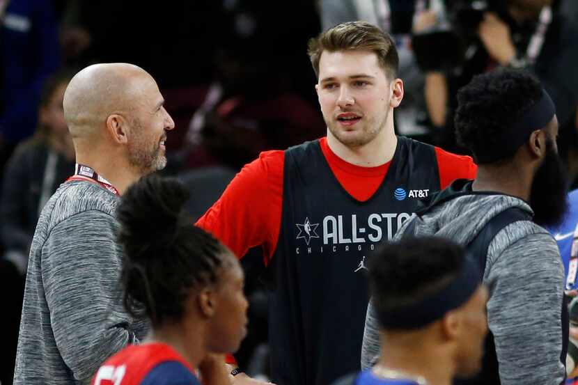 Team LeBron's Dallas Mavericks forward Luka Doncic (77) talks with Los Angeles Lakers...