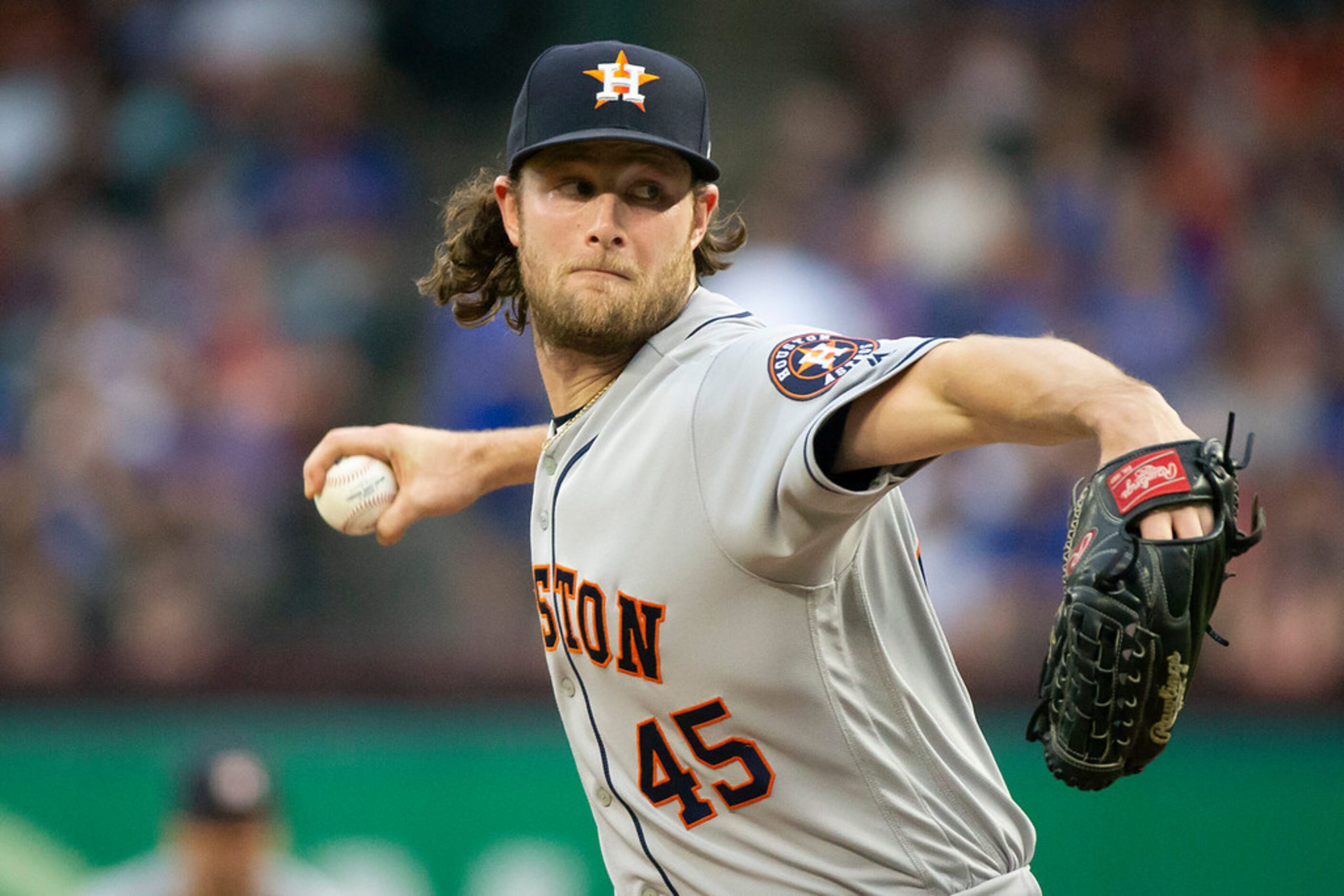 Houston Astros starting pitcher Gerrit Cole delivers a pitch during the first inning against...