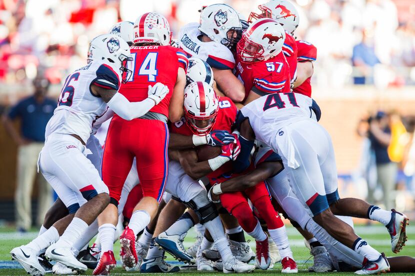 Southern Methodist Mustangs running back Braeden West (6) is tackled during the fourth...