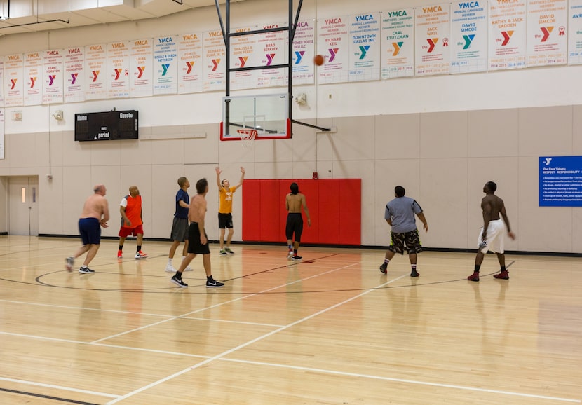 Members play basketball at the T. Boone Pickens YMCA in downtown Dallas.