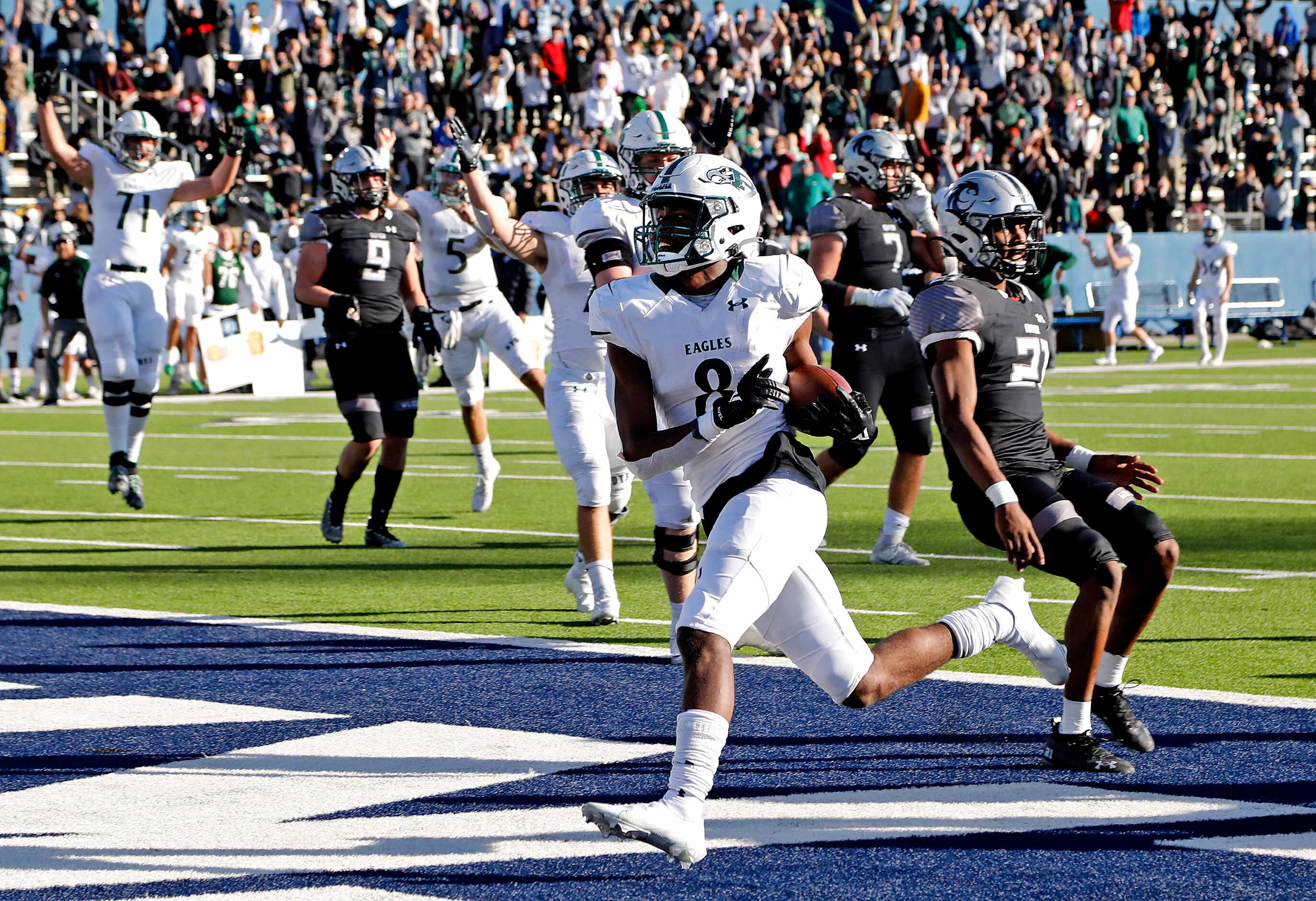 Prosper High School wide receiver Tyler Bailey (8) crosses the goal line to tie the game...