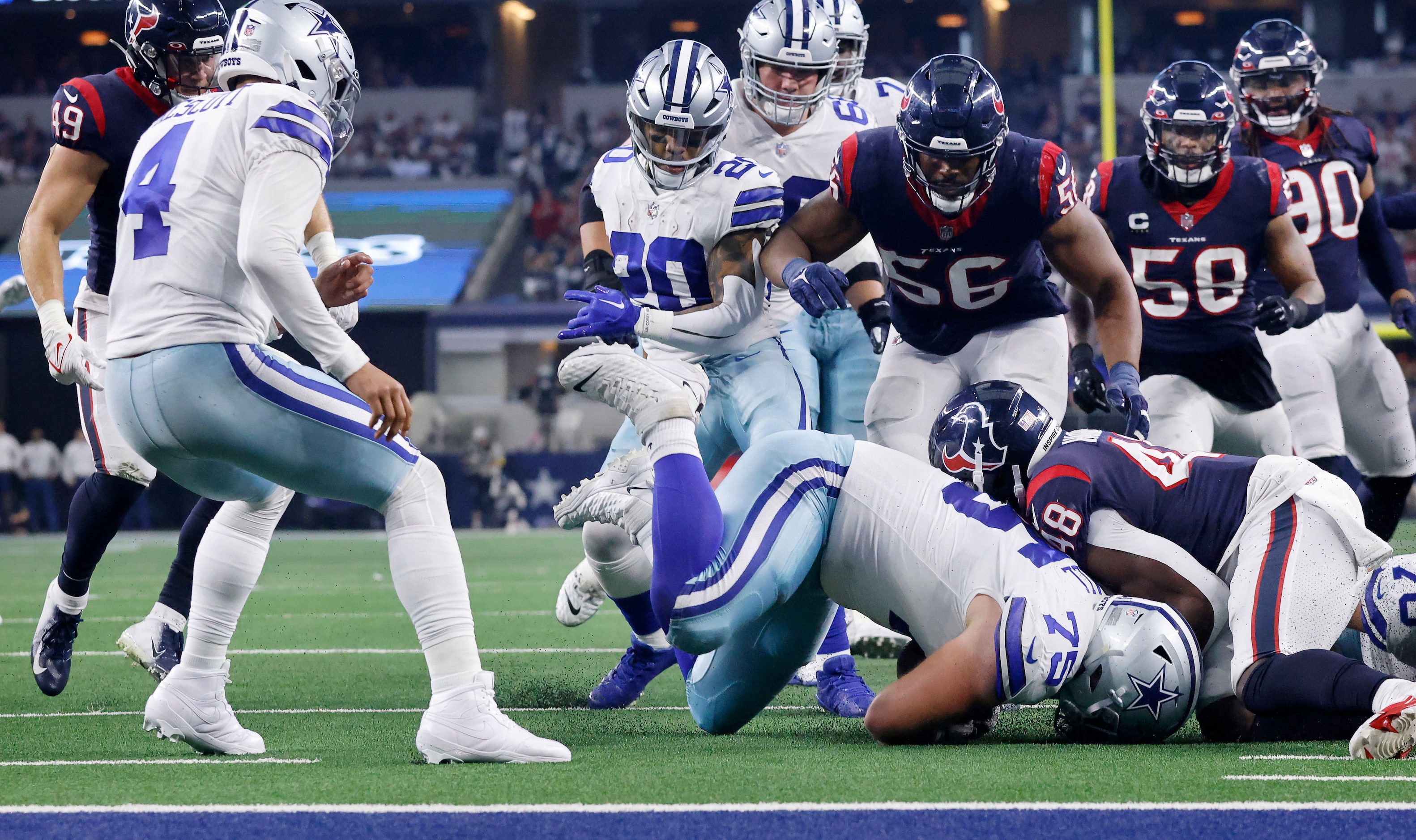 Dallas Cowboys offensive tackle Josh Ball (75) recovers Dak Prescott’s fumble during the...