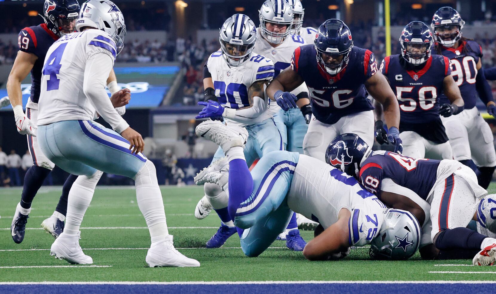 Houston Texans defensive tackle Thomas Booker IV (56) warms up before  taking on the New York